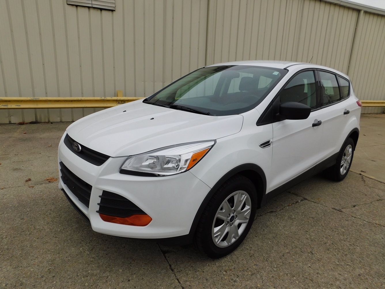 Front view of White and Black 2014 Ford Escape SUV featured at Goodwill Auto Auction